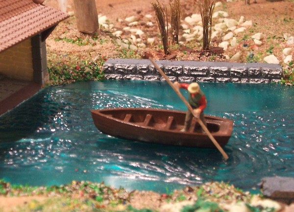 LE PECHEUR ET SON EMBARCATION.